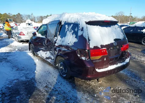 2010 Honda Odyssey Touring z USA, uszkodzony, nr VIN 5FNRL3H95AB042766